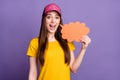 Photo of young happy cheerful happy woman hold hand cloud speech bubble talk isolated on violet color background