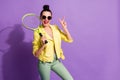 Photo of young happy cheerful positive beautiful girl woman female hold badminton rocket showing v-sign isolated on Royalty Free Stock Photo