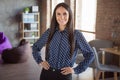 Photo of young happy cheerful positive good mood smiling businesswoman in dotted blouse work at office workplace Royalty Free Stock Photo