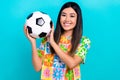 Photo of young japanese woman soccer ball wear flowers print stylish t-shirt football sport fan isolated on aquamarine Royalty Free Stock Photo