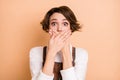 Photo of young lovely amazed surprised worried girl cover mouth hear shocking news isolated on pastel color background