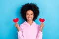 Photo of young lovely girl hold little paper heart cupid romantic dream gift isolated over blue color background