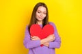 Photo of young lovely pretty woman hold paper heart hug herself good mood closed eyes dreaming about her boyfriend Royalty Free Stock Photo