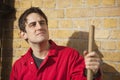 Portrait of young male street sweeper