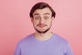 Photo of young man comic crazy dumb fooling childish hold breath isolated over pink color background