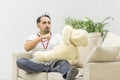 Photo of young man playing game at home. Royalty Free Stock Photo