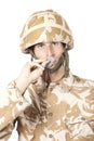 Portrait of young military guy in uniform kissing his dog tag Royalty Free Stock Photo