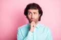 Photo of young multiethnic handsome man think thoughtful minded hand touch chin look empty space isolated over pink Royalty Free Stock Photo