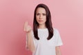 Photo of young negative moody woman ask money bankrupt salary credit isolated over pink color background