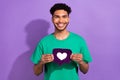 Photo of young optimistic hipster blogger guy funny hairstyle hold paper like symbol comment icon isolated on purple