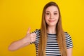 Photo of young pretty lady show thumb-up good perect advertise select isolated over yellow color background