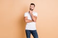 Photo of young serious handsome man dream dreamy think look empty space pensive isolated over beige color background Royalty Free Stock Photo