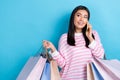 Photo of young shopaholic fashionista japanese woman wear pink striped sweater talking smartphone look mockup 