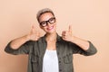 Photo of young short hairdo lady double thumbs up high income vacancy hr manager recommend her company isolated on beige