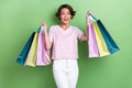 Photo of young smiling positive cute pretty adorable woman hold many shopping package toothy crazy excited nice mood