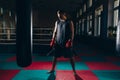 Photo of young strong sports man boxer make exercises in gym. Royalty Free Stock Photo