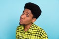 Photo of young suspicious afro american man look you doubt face upset isolated on pastel blue color background