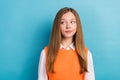 Photo of young suspicious minded creative teenage girl wear orange knitted jumper with shirt look empty space isolated