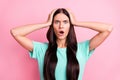 Photo of young unhappy upset shocked amazed surprised girl hear bad news isolated on pink color background