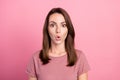 Photo of young woman amazed shocked omg wow reaction news fake novelty isolated over pink color background Royalty Free Stock Photo