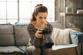 Photo of young woman with brown hair using dslr photo camera Royalty Free Stock Photo