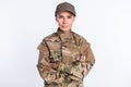 Photo of young woman confident soldier army officer crossed hands uniform isolated over white color background Royalty Free Stock Photo