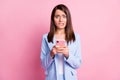 Photo of young woman nervous panic fail mistake dislike use smartphone over pastel color background