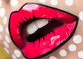 Photo of young woman with professional comic pop art make-up. Creative beauty style. Close up lips