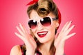 A young woman in the style of pin-up wear sunglasses Royalty Free Stock Photo