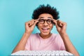 Photo of youngster geek student guy addicted professional programmer touch his computer glasses before coding isolated Royalty Free Stock Photo