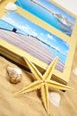 Photoalbum with souvenirs and shells with sand