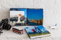 Photobook Album with Travel Photo with toy bus and plane. photo book