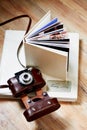 Photobook with a cover of leatherette and the old camera