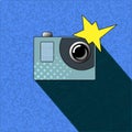 Photocamera with flash in pop art style. Action camera with small lens and metallic button.