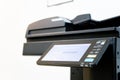 The photocopier or network printer is office worker tool equipment for scanning and copy paper