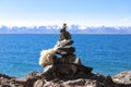 Mani pile beside the Nam Lake under the Snow Mountain Royalty Free Stock Photo