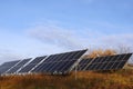 Photoelectric batteries on the background of a blue sky with clouds