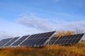 Photoelectric batteries on the background of a blue sky with clouds