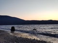 Photograph of the Adriatic sea from Albania against a nuanced sky at dusk