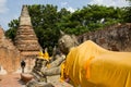 A Photograph of ancient pagoda with statue of Reclining Buddha