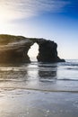 Photograph of arches formed by the beach cliffs