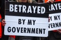 Photograph of a `betrayed by my government` placard during a protest in support of Insulate Britain