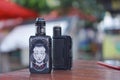 Photograph of black colored vape on the table Royalty Free Stock Photo