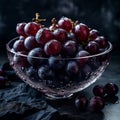 Deep Purple Grapes in a Glass Bowl