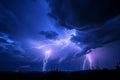 A photograph capturing a large cloud filled with numerous powerful lightning bolts illuminating the sky, Streaks of lightning Royalty Free Stock Photo