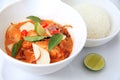 Chicken curry food in white bowl with rice and lime with basil leaf