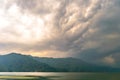 Photograph of cloud, lake, mountain and reflexion Near Pokhara Lake at Kathmandu Nepal. Snap in portrait, landscape, wide screen.