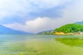 Photograph of cloud, lake, mountain and reflexion Near Pokhara Lake at Kathmandu Nepal. Snap in portrait, landscape, wide screen.