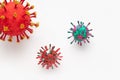 A photograph of a collection of three colorful 3D Virus artwork model forms inspired by the Covid-19 lockdown of 2020