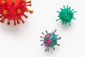 A photograph of a collection of three colorful 3D Virus artwork model forms inspired by the Covid-19 lockdown of 2020